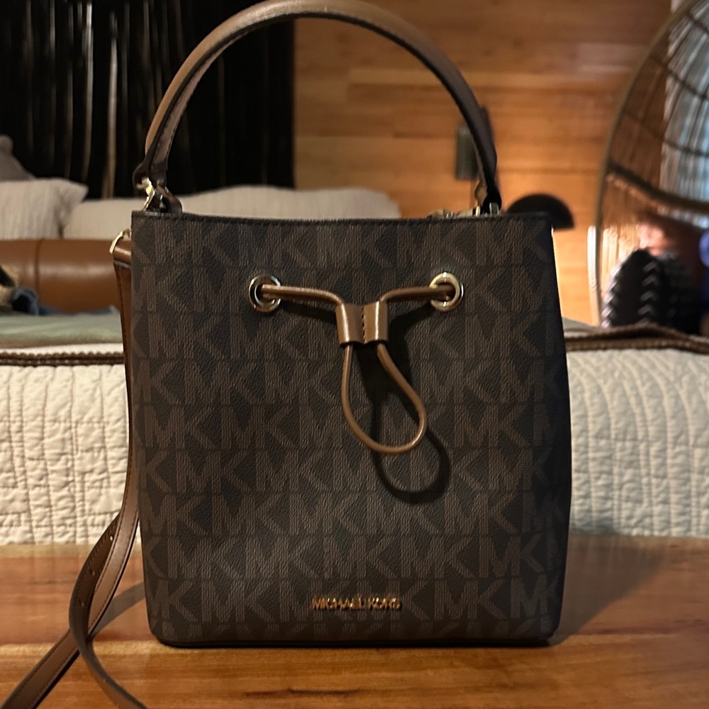Michael Kors Dark Brown Monogram Drawstring Bucke… - image 1